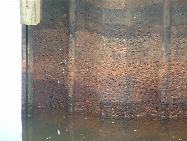 Sheet metal in water showing rust