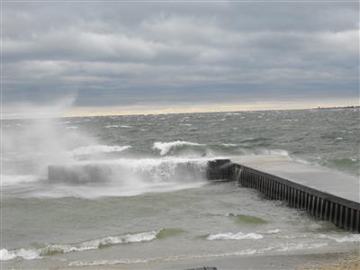 High water lapping over a pier